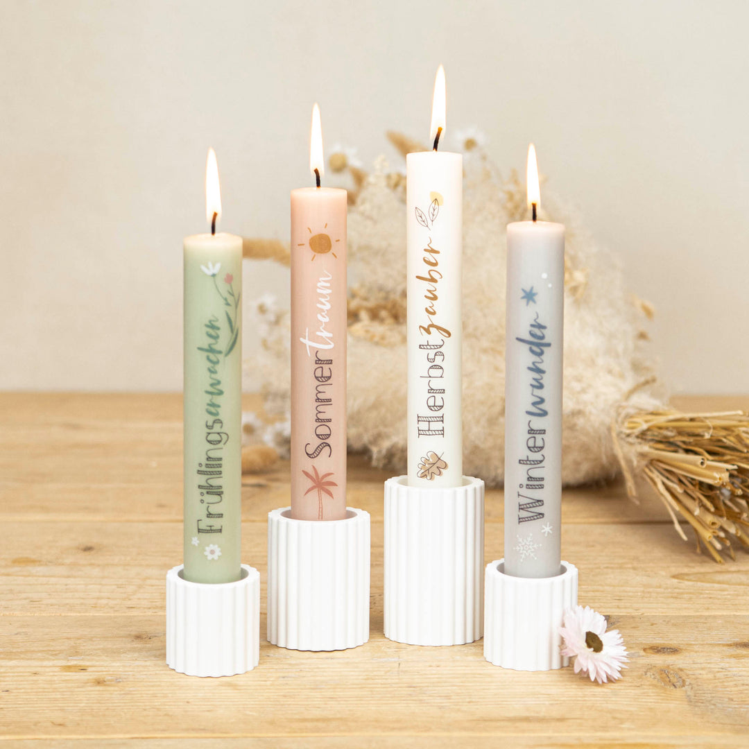 Bunte Stabkerzen im 4er-Set mit Motiven
