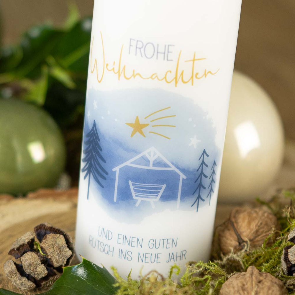 Kerze mit Krippe zu Weihnachten