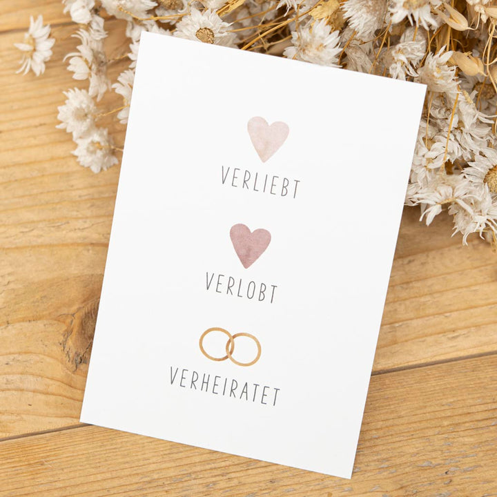 Grußkarte Hochzeit mit Herzen und Ringen