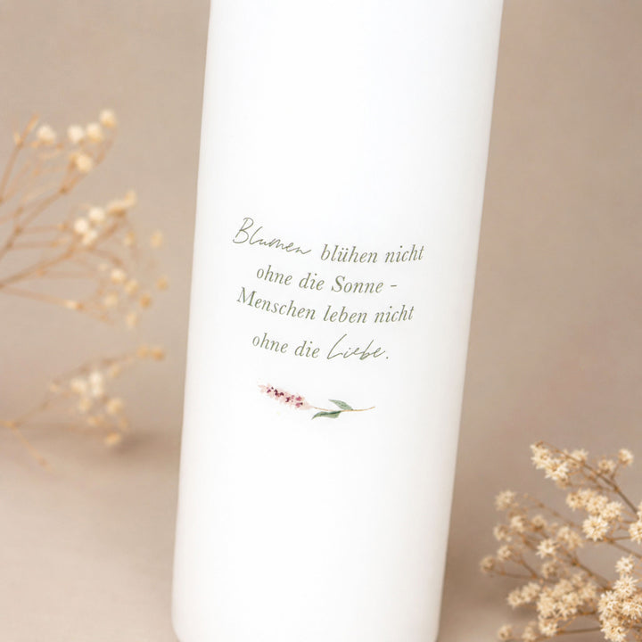 Hochzeitskerze mit Trauspruch auf der Rückseite passend zum Blumenmotiv der Kerze