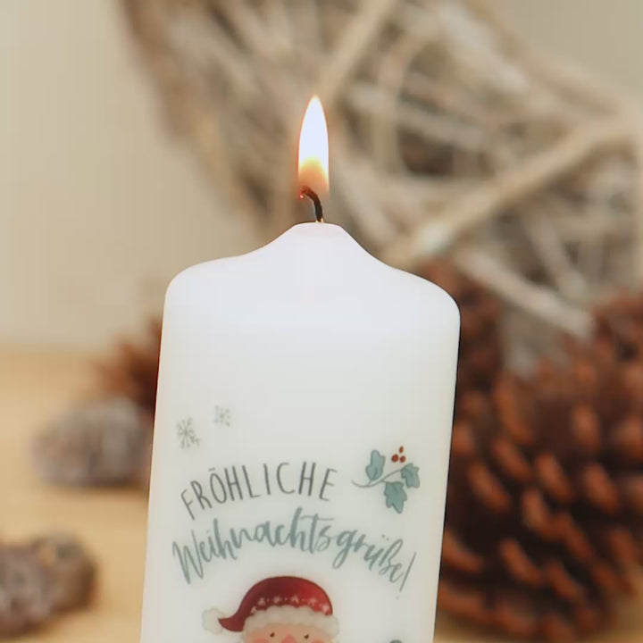 Weihnachtskerze Weihnachtsmann mit dem Aufspruch fröhliche Weihnachtsgrüße