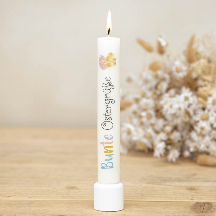 Stabkerze mit dem Aufdruck Bunte Ostergrüße