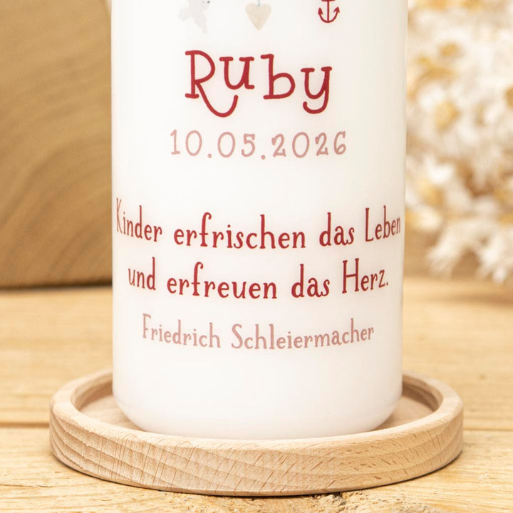 Taufkerze mit Namen, Datum und Taufspruch