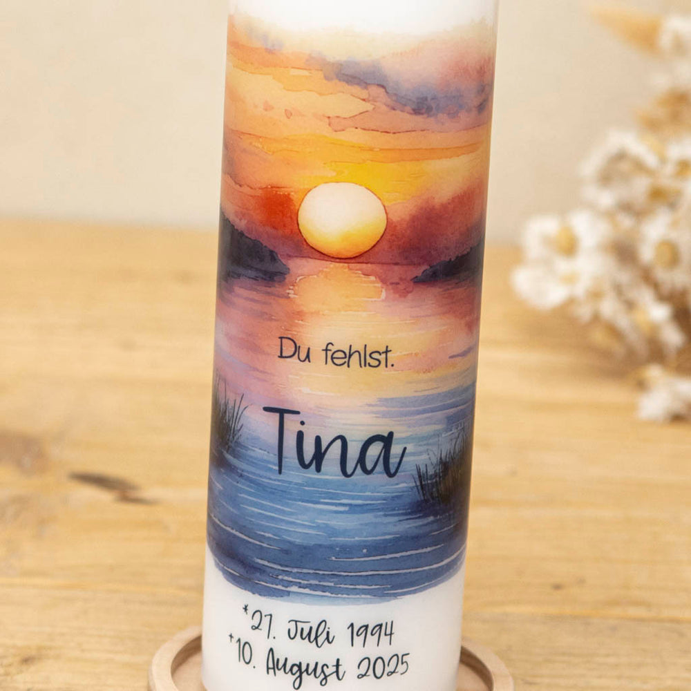 Trauerkerze Sonnenuntergang in warmen Farben mit Namen und Trauerspruch