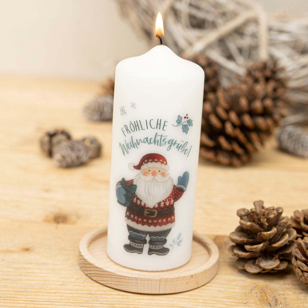 Weihnachtskerze als Geschenk zu Weihnachten mit Weihnachtsmann als Motiv