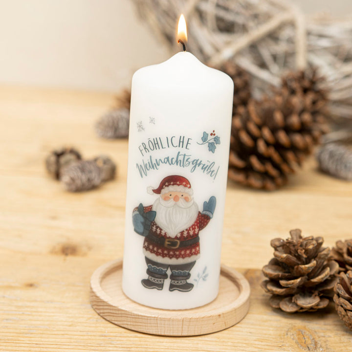 Weihnachtskerze als Geschenk zu Weihnachten mit Weihnachtsmann als Motiv