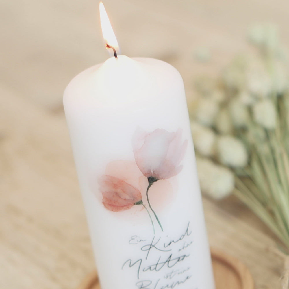 Video von einer Muttertagskerze mit Blumen und Spruch