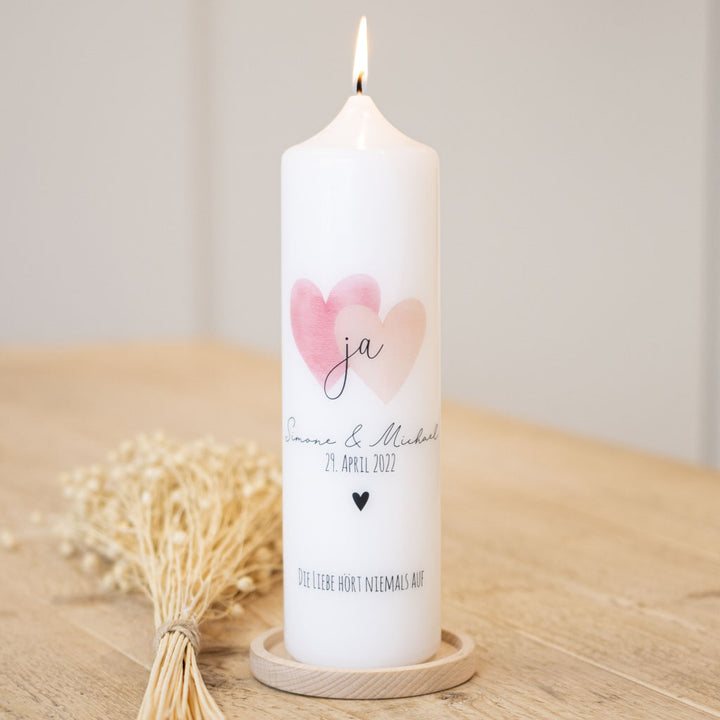 Hochzeitskerze mit Herzen