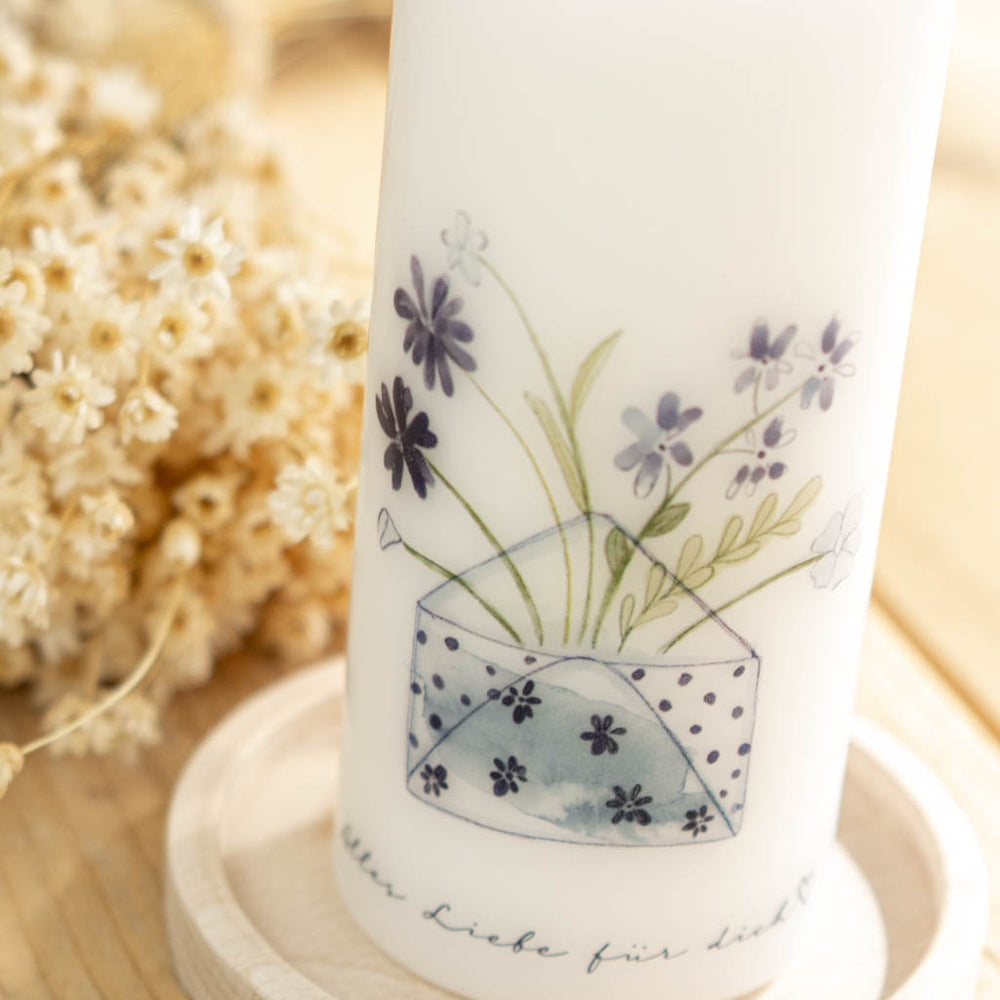 Blumenmotiv auf der Mutmacher Kerze Blumengruß